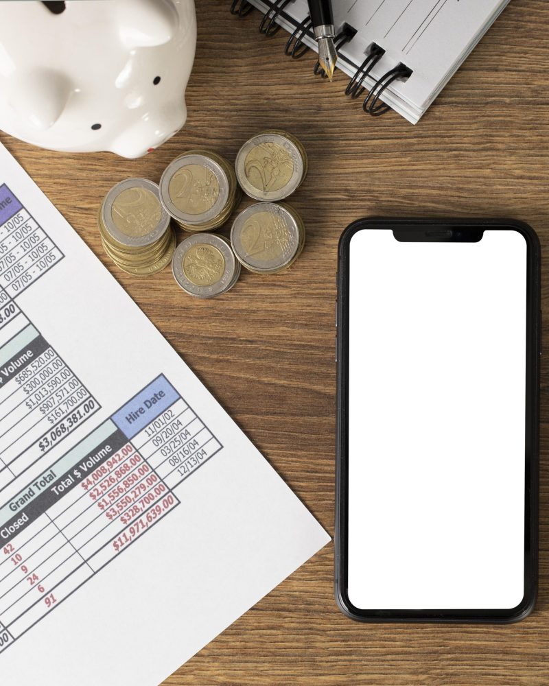 arrangement-finances-elements-with-empty-smartphone
